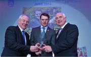 10 December 2014; June award winner Aidan O'Brien, horse trainer, is presented with his award by Minister of State for Tourism and Sport, Michael Ring T.D, left, and Cel O'Reilly, Managing Director, Philips Electronics Ireland. Philips Sports Manager of the Year 2014, Shelbourne Hotel, Dublin. Picture credit: Matt Browne / SPORTSFILE