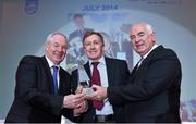 10 December 2014; July award winner Michael Bannon, coach of Rory Mcllroy, is presented with his award by Minister of State for Tourism and Sport, Michael Ring T.D, left, and Cel O'Reilly, Managing Director, Philips Electronics Ireland. Philips Sports Manager of the Year 2014, Shelbourne Hotel, Dublin. Picture credit: Matt Browne / SPORTSFILE