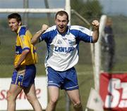 20 May 2007; Waterford's Shane Biggs celebrates after the final whistle while Clare's Cathal Lafferty looks on. Bank of Ireland Munster Senior Football Championship Quarter-Final, Waterford v Clare, Fraher Field, Dungarvan, Co. Waterford. Picture credit: Matt Browne / SPORTSFILE