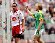 4 August 2007; Meath's Graham Geraghty celebrates after scoring his side's first goal as Tyrone's Ryan McMenamin looks on. Bank of Ireland Football Championship Quarter Final, Tyrone v Meath, Croke Park, Dublin. Picture Credit; Brian Lawless / SPORTSFILE