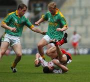 4 August 2007; Sean Cavanagh, Tyrone, in action against Nigel Crawford, right, and Graham Geraghty, Meath. Bank of Ireland Football Championship Quarter Final, Tyrone v Meath, Croke Park, Dublin. Picture Credit; Stephen McCarthy / SPORTSFILE