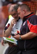 4 August 2007; Tyrone manager, Mickey Harte, and team trainer, Fergal McCann, after the final whistle. Bank of Ireland Football Championship Quarter Final, Tyrone v Meath, Croke Park, Dublin. Picture Credit; Stephen McCarthy / SPORTSFILE