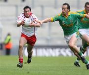 4 August 2007; David Harte, Tyrone, in action against Anthony Moyles, Meath. Bank of Ireland Football Championship Quarter Final, Tyrone v Meath, Croke Park, Dublin. Picture Credit; Oliver McVeigh / SPORTSFILE
