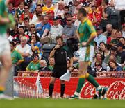 4 August 2007; Linesman Donie Cahill, Tipperary, communicates with the match referee. Bank of Ireland Football Championship Quarter Final, Tyrone v Meath, Croke Park, Dublin. Picture Credit; Ray McManus / SPORTSFILE