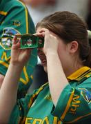 4 August 2007; A Meath supporter uses a promotional pair of binoculars during the game. Bank of Ireland Football Championship Quarter Final, Tyrone v Meath, Croke Park, Dublin. Picture Credit; Ray McManus / SPORTSFILE