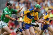 29 July 2007; Diarmuid McMahon, Clare, in action against Brian Geary, Limerick. Guinness All-Ireland Senior Hurling Championship Quarter-Final, Clare v Limerick, Croke Park, Dublin. Picture credit; Ray McManus / SPORTSFILE