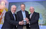 10 December 2014; Joe Schmidt, Ireland rugby head coach, is presented with the Philips Sports Manager of the Year 2014 award by Minister of State for Tourism and Sport, Michael Ring T.D, left, and Cel O'Reilly, Managing Director, Philips Electronics Ireland. Shelbourne Hotel, Dublin. Picture credit: Matt Browne / SPORTSFILE