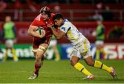 6 December 2014; Tommy O'Donnell, Munster, is tackled by Wesley Fofana, ASM Clermont Auvergne. European Rugby Champions Cup 2014/15, Pool 1, Round 3, Munster v ASM Clermont Auvergne, Thomond Park, Limerick. Picture credit: Brendan Moran / SPORTSFILE