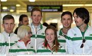 12 December 2014; Ireland's Fionnuala Britton, centre, in conversation with Ann-Marie McGlynn, Women's Team Captain, left, and Mick Clohisey, Men's Team Captain, with U23 Men Liam Brady and Brandon Hargreaves and senior member Conor Dooney behind, ahead of departing for the Spar European Cross Country Championships in Samokov, Bulgaria. Dublin Airport, Dublin. Picture credit: Ramsey Cardy / SPORTSFILE
