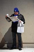 13 December 2014; A Leinster supporter studies a copy of today's Irish Independent ahead of the game. European Rugby Champions Cup 2014/15, Pool 2, Round 4, Leinster v Harlequins. Aviva Stadium, Lansdowne Road, Dublin. Picture credit: Stephen McCarthy / SPORTSFILE