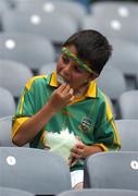 4 August 2007; Davd Ryan, age 9, from Ratoath, Co. Meath, tucks into his green candy floss before the game. Bank of Ireland Football Championship Quarter Final, Sligo v Cork, Croke Park, Dublin. Picture Credit; Stephen McCarthy / SPORTSFILE