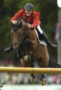 10 August 2007; Thomas Muhlbauer, Germany, on Asti Squmante, jumps the last during the Aga Khan Nations Trophy. Failte Ireland Dublin Horse Show, RDS Main Arena, RDS, Dublin. Picture credit; Matt Browne / SPORTSFILE