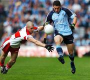 11 August 2007; Bernard Brogan, Dublin, in action against Francis McEldowney, Derry. Bank of Ireland All-Ireland Senior Football Championship Quarter-Final, Dublin v Derry, Croke Park, Dublin. Picture credit; Brendan Moran / SPORTSFILE