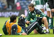 11 August 2007; Shane Horgan, Ireland, lies on the ground after injuring himself in the warm up and is attended to by Cameron Steele, Physiotherapist. Rugby World Cup Warm Up Game, Scotland v Ireland, Murrayfield, Scotland. Picture credit; Oliver McVeigh / SPORTSFILE