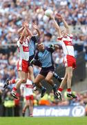 11 August 2007; Derry's Enda Muldoon and Patsy Bradley, left, in action against Dublin's Paul Casey and Darren Magee, left. Bank of Ireland All-Ireland Senior Football Championship Quarter-Final, Dublin v Derry, Croke Park, Dublin. Picture credit; Pat Murphy / SPORTSFILE