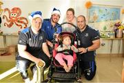 13 December 2014; Leinster Rugby players have called on fans to pick up a blue LauraLynn Santa Hat for this Friday’s match against Connacht (RDS kick off 7:35pm) and raise much needed funds for Ireland’s only Children’s Hospice, LauraLynn. Kane Douglas, James Tracy and Richardt Strauss called in to LauraLynn to visit children, families and staff and met with some of the children with life limiting conditions, to see first-hand the difference the money raised will make, including Taylor Rose Russell. LauraLynn is Ireland’s only children’s hospice and are one of the charity partners for Leinster Rugby for the season. At the game, LauraLynn will be selling blue Santa hats with all proceeds going to LauraLynn and supporters will also be asked to show their support by texting LAURALYNN to 50300 to make a €4  donation this Christmas. Anyone wishing to learn more about the partnership can visit www.leinsterrugby.ie/charitypartners or check out www.lauralynn.ie. Picture credit: Ramsey Cardy / SPORTSFILE