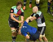 13 December 2014; Dominic Ryan, Leinster, falls to the ground after being restrained by Charlie Mathews, left, and George Robson, right, Harlequins. European Rugby Champions Cup 2014/15, Pool 2, Round 4, Leinster v Harlequins. Aviva Stadium, Lansdowne Road, Dublin. Picture credit: Barry Cregg / SPORTSFILE