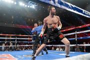 13 December 2014; Andy Lee, front, and Matt Korborov, far left, after referee Kenny Bayless stops the fight and declares a technical knock out in the sixth round. WBO middleweight title fight. The Cosmopolitan, Las Vegas, NV, USA. Picture credit: Joe Camporeale / SPORTSFILE