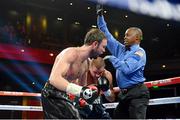 13 December 2014; Andy Lee, left, after referee Kenny Bayless stops the fight and declares a technical knock out in the sixth round against Matt Korborov, centre. WBO middleweight title fight. The Cosmopolitan, Las Vegas, NV, USA. Picture credit: Joe Camporeale / SPORTSFILE