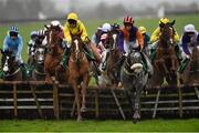 14 December 2014; Too Scoops, left, with Andrew Lynch up, jumps the third together with Going Grey, with Conor Maxwell up, during the The 2015 Navan Race Membership Club Ideal Christmas Present Handicap Hurdle. Horse racing from Navan, Co. Meath. Picture credit: Barry Cregg / SPORTSFILE