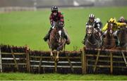 14 December 2014; Shabra's Bertolini, with Jonathan Moore up, clears the last on his way to winning The 2015 Navan Race Membership Club Ideal Christmas Present Handicap Hurdle. Horse racing from Navan, Co. Meath. Picture credit: Barry Cregg / SPORTSFILE