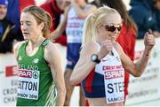 14 December 2014; Ireland's Fionnuala Britton, left, after finishing in 6th place, as race winner Gemma Steel celebrates after the Women's race. Spar European Cross Country Championships, Samokov, Bulgaria. Picture credit: Ramsey Cardy / SPORTSFILE