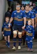 13 December 2014; Leinster mascots Daniel Dunne, left, from Mucklagh, Co. Offaly and Kate Macadam, from Greystones, Co. Wicklow, lead out the team with Leinster captain Jamie Heaslip. Mascots at Leinster v Harlequins  European Rugby Champions Cup 2014/15, Pool 2, Round 4, Leinster v Harlequins. Aviva Stadium, Lansdowne Road, Dublin. Picture credit: Brendan Moran / SPORTSFILE