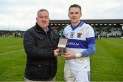 14 December 2014; St Vincent's Tomas Quinn is presented with the Man of the Match award by Padraig McGowan, Branch Manager, AIB Dame Street, Dublin. AIB Leinster GAA Football Senior Club Championship Final, Rhode v St Vincent's, Pairc Táilteann, Navan, Co. Meath. Picture credit: Pat Murphy / SPORTSFILE