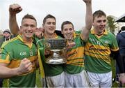14 December 2014; Gort's Gerard O'Donoghue, Richard Cummins, Michael Cummins and Conor Helebert celebrate with the Tom Callanan Cup. Galway County Senior Hurling Championship Final, Portumna v Gort, Kenny Park, Athenry, Co. Galway. Picture credit: Ray Ryan / SPORTSFILE