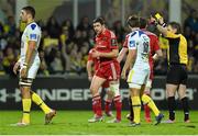 13 December 2014;  Munster's Felix Jones, centre, is yellow carded by referee Nigel Owens. European Rugby Champions Cup 2014/15, Pool 1, Round 4, ASM Clermont Auvergne v Munster, Stade Marcel-Michelin, Clermont, France. Picture credit: Matt Browne / SPORTSFILE