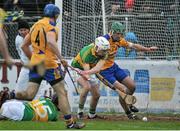 14 December 2014; Wayne Walsh, Gort, scores a goal despits the challenge from Gareth Heagney, Portumna. Galway County Senior Hurling Championship Final, Portumna v Gort, Kenny Park, Athenry, Co. Galway. Picture credit: Ray Ryan / SPORTSFILE
