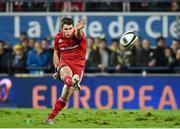 14 December 2014; Ian Keatley, Munster, kicks a penalty with the final kick of the game, which secured a losing bonus point against ASM Clermont Auvergne. European Rugby Champions Cup 2014/15, Pool 1, Round 4, ASM Clermont Auvergne v Munster, Stade Marcel-Michelin, Clermont, France. Picture credit: Matt Browne / SPORTSFILE