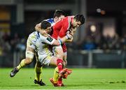 13 December 2014; Conor Murray, Munster, is tackled by Benjamin Kayser and Jamie Cudmore, ASM Clermont Auvergne. European Rugby Champions Cup 2014/15, Pool 1, Round 4, ASM Clermont Auvergne v Munster, Stade Marcel-Michelin, Clermont, France. Picture credit: Matt Browne / SPORTSFILE