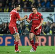 14 December 2014; Ian Keatley is congratulated by Munster team-mate Conor Murray after he kicked a penalty with the final kick of the game, which secured a losing bonus point against ASM Clermont Auvergne. European Rugby Champions Cup 2014/15, Pool 1, Round 4, ASM Clermont Auvergne v Munster, Stade Marcel-Michelin, Clermont, France. Picture credit: Matt Browne / SPORTSFILE