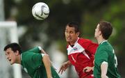 9 August 2007; Ireland's Darren Forsyth, left, from Sallynoggin, Dublin, representing UCD, and Killian Gallagher, from Dun Laoghaire, Dublin, representing DIT, in action against Panupong Wongsa, Thailand. World University Games 2007, Men's Soccer, Pool A, Ireland v Thailand, Rajamangala University of Technology, Main Stadium, Bangkok, Thailand. Picture credit: Brian Lawless / SPORTSFILE