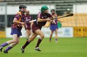 11 August 2007; Therese Maher, Galway, in action against Caroline Murphy, Wexford. Gala All-Ireland Senior Camogie Championship semi-final, Wexford v Galway, Nowlan Park, Co. Kilkenny. Picture credit: Matt Browne / SPORTSFILE