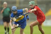 11 August 2007; Una O'Dwyer, Tipperary, in action against Orla Cotter, Cork. Gala All-Ireland Senior Camogie Championship semi-final, Cork v Tipperary, Nowlan Park, Co. Kilkenny. Picture credit: Matt Browne / SPORTSFILE