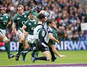 11 August 2007; Brian O'Driscoll, Ireland, tackled by Andrew Henderson and Chris Patterson, Scotland. Rugby World Cup Warm Up Game, Scotland v Ireland, Murrayfield, Scotland. Picture credit; Oliver McVeigh / SPORTSFILE