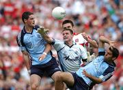 11 August 2007; Dublin goalkeeper Stephen Cluxton attempts to get to the ball ahead of team-mates Ross McConnell, left, and David Henry and Derry's Eoin Bradley. Bank of Ireland All-Ireland Senior Football Championship Quarter-Final, Dublin v Derry, Croke Park, Dublin. Picture credit; Brendan Moran / SPORTSFILE