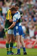 12 August 2007; Monaghan corner-forward Thomas Freeman is comforted by Kerry's Kieran Donaghy after the final whistle. Bank of Ireland All-Ireland Senior Football Championship Quarter-Final, Kerry v Monaghan, Croke Park, Dublin. Picture credit; Ray McManus / SPORTSFILE