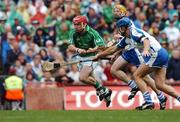 12 August 2007; Andrew O'Shaughnessy, Limerick, scores his side's second goal despite the attentions of Aidan Kearney and Declan Prendergast, right, Waterford. Guinness All-Ireland Senior Hurling Championship Semi-Final, Limerick v Waterford, Croke Park, Dublin. Picture credit; Brendan Moran / SPORTSFILE
