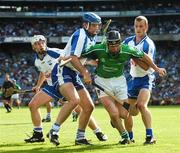 12 August 2007; Mark O'Riordan, Limerick, prepares to clear under pressure from Michael Walsh and Eoin McGrath, Waterford. Guinness All-Ireland Senior Hurling Championship Semi-Final, Limerick v Waterford, Croke Park, Dublin. Picture credit; Ray McManus / SPORTSFILE