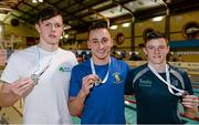 14 December 2014; Medallists in the Mens 50m Butterfly, from left, Brendan Hyland, silver, Tallaght swimming club, Jamie Graham, gold, Bangor swimming club, and Conor Munn, bronze, Ards swimming club, at  Day 3 of the Irish Short Course Swimming Championships. Lagan Valley LeisurePlex, Lisburn, Co. Antrim. Picture credit: Oliver McVeigh / SPORTSFILE
