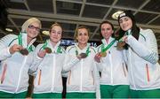 15 December 2014; Team Ireland athletes, who won team bronze medals in the Senior Women's event, clockwise, from left, Ann Marie McGlynn, Fionnuala Britton, Michelle Finn, Siobhan O'Doherty and Laura Crowe in Dublin Airport on their return home from the Spar European Cross Country Championships in Bulgaria. Terminal 1, Dublin Airport, Dublin. Picture credit: Brendan Moran / SPORTSFILE