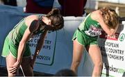 14 December 2014; Ireland's Sara Treacy, left, and Michelle Finn after the Women's race. Spar European Cross Country Championships, Samokov, Bulgaria. Picture credit: Ramsey Cardy / SPORTSFILE