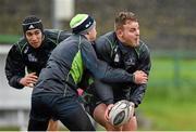 16 December 2014; Connacht's Finlay Bealham, right, is tackled by team-mates Ultan Dillane and Danie Poolamn, left, during squad training ahead of their Guinness PRO12, Round 10, match against Leinster on Friday. Connacht Rugby Squad Training, Sportsground, Galway. Picture credit: Barry Cregg / SPORTSFILE
