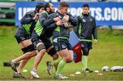 16 December 2014; Connacht's Finlay Bealham, right, is tackled by team-mates George Naoupu and Ultan Dillane during squad training ahead of their Guinness PRO12, Round 10, match against Leinster on Friday. Connacht Rugby Squad Training, Sportsground, Galway. Picture credit: Barry Cregg / SPORTSFILE