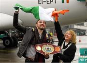 17 December 2014; WBO Middleweight Champion Andy Lee, with his mother Anne Lee, on his return from the USA after defeating Russian Matt Korborov. Shannon Airport, Co Clare. Picture credit: Diarmuid Greene / SPORTSFILE