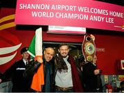 17 December 2014; WBO Middleweight Champion Andy Lee with his trainerAdam Booth, on his return from the USA after defeating Russian Matt Korborov. Shannon Airport, Co Clare. Picture credit: Diarmuid Greene / SPORTSFILE
