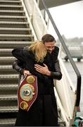 17 December 2014; WBO Middleweight Champion Andy Lee is greeted by his mother Anne on his return from the USA after defeating Russian Matt Korborov. Shannon Airport, Co Clare. Picture credit: Diarmuid Greene / SPORTSFILE